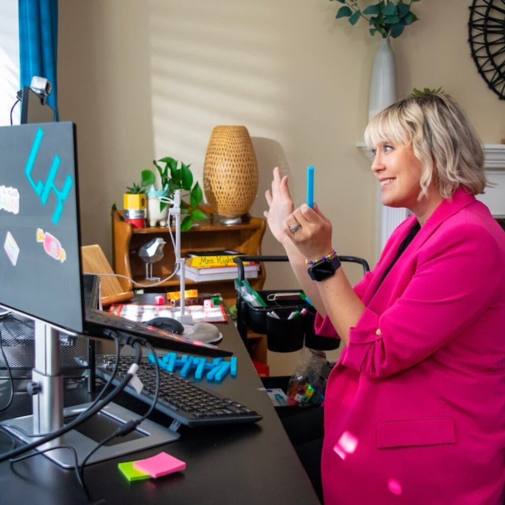 Woman wearing a pink blazer